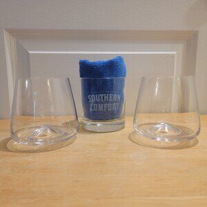 3 Whiskey Glasses. 2 Swirl with concave bottoms & 1 Southern Comfort.